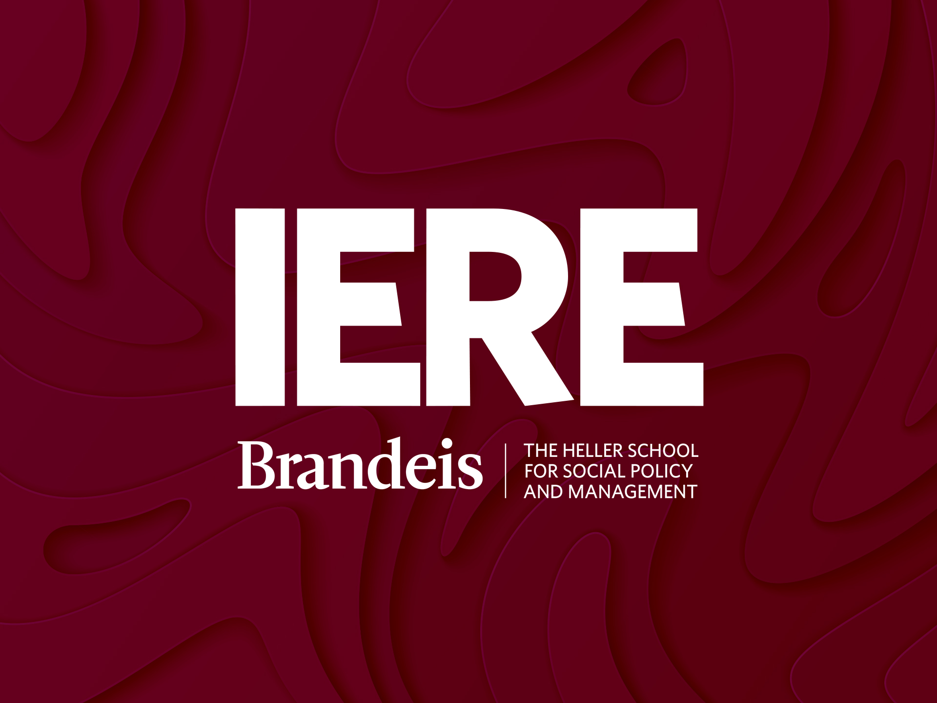 The letters I, E, R, E in large bold white text on a dark maroon background with a sharp wavy texture.