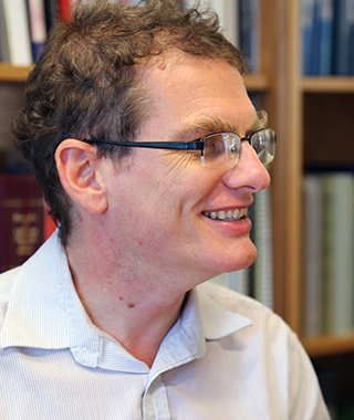 Head shot of Professor Dominic Hodgkin