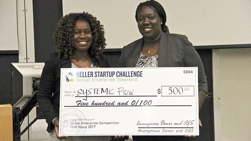 Image of sySTEMic flow group holding their second place check
