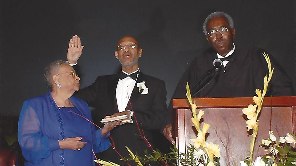 Otis Johnson being sworn in