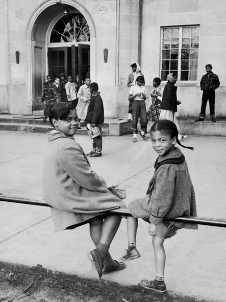 Black and white photo of Linda Brown and friend on school campus