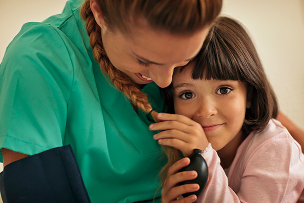Healthcare worker with child