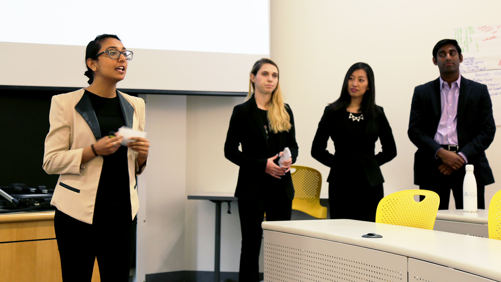 A team of Heller-Tufts MD/MBA students present on their TCP project with the Planned Parenthood League of Massachusetts