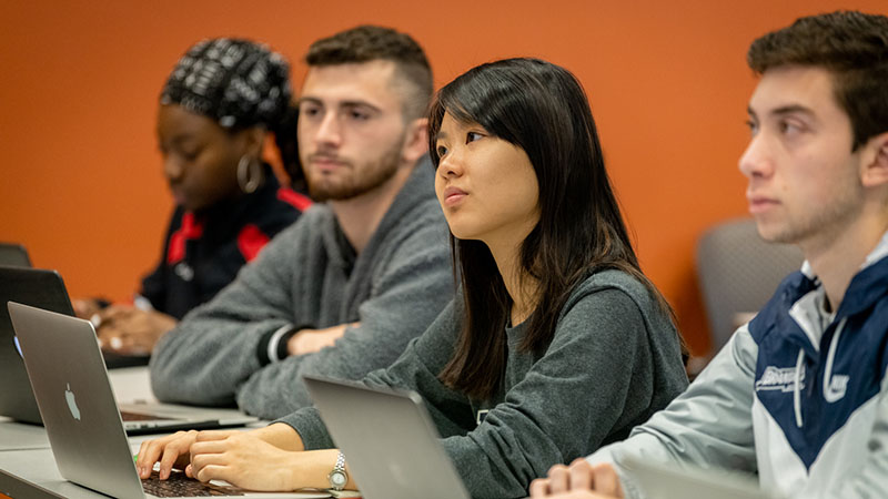 Image of students listening in class