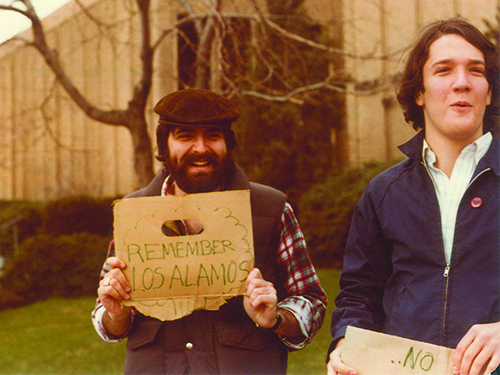historic photo of David Weil and a friend at a protest, circa 1979