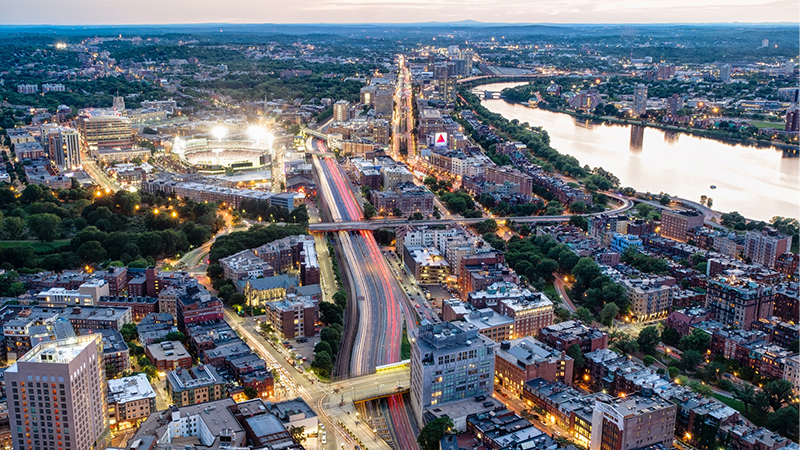 aerial photo of Boston and Cambridge at twilight