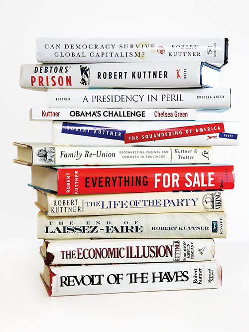 A stack of the eleven books authored by Robert Kuttner