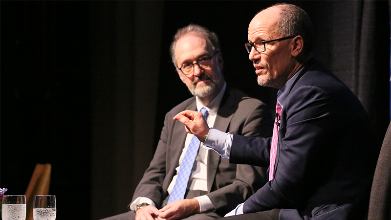 David Weil and Tom Perez on stage