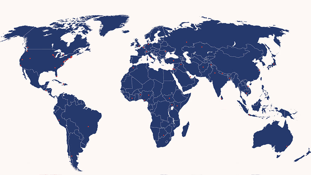 World map with red dots representing locations of Heller alumni