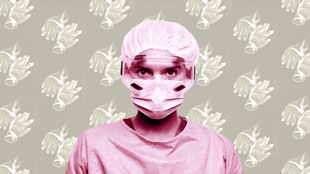 Medical worker in personal protective equipment against a backdrop of repeating gloves