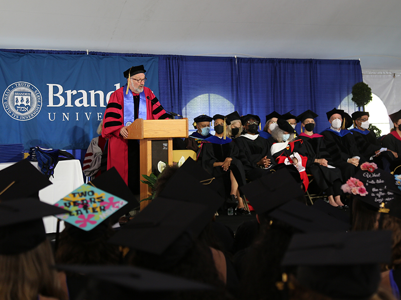 Dean David Weil at the podium during commencement