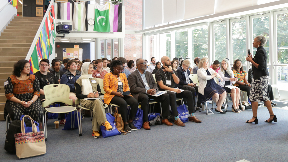 Interim Dean Maria Madison speaks to the Heller community during orientation, August 28, 2023.