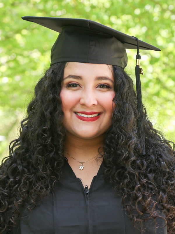 Fabiola Mejia Rodriguez, MA SID/COEX'24 in graduation cap and gown