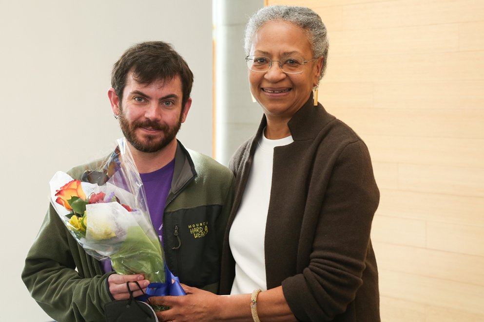 Ian Moura, PhD candidate, with Interim Dean Maria Madison at the 2024 Heller Awards ceremony