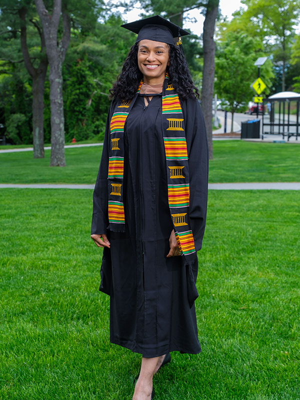 Dr. Simone Wildes, EMBA'24, in graduation cap and gown