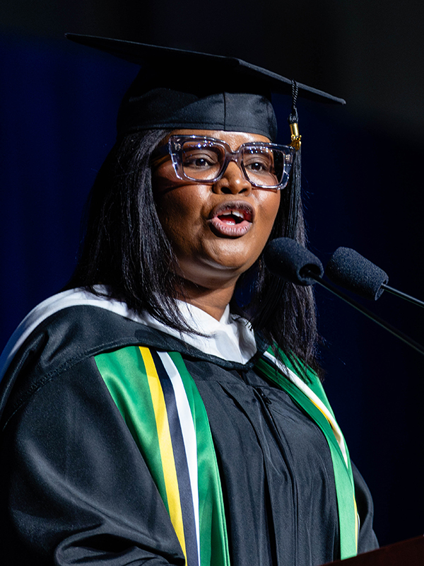 Giselle Gabriel, MA SID'25, delivers the graduate commencement address at Brandeis' commencement, May 18, 2025.