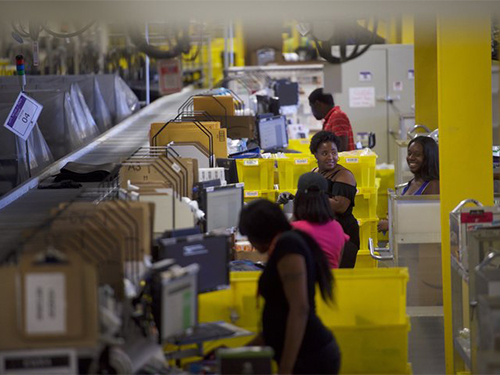 Workers at the Amazon fulfillment center in Robbinsville, New Jersey