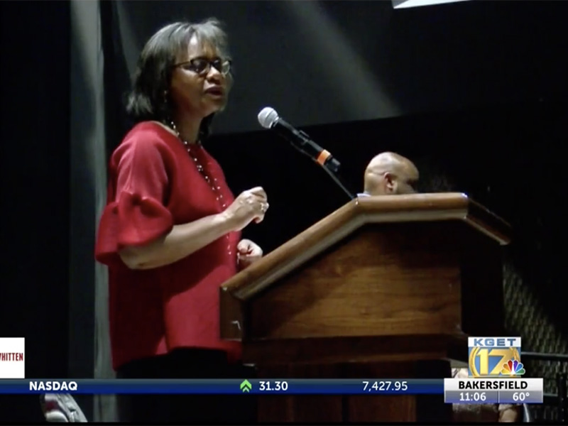 Anita Hill giving a speech