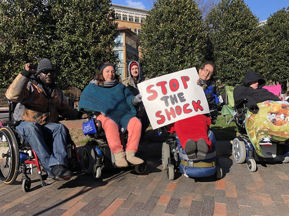 People in wheelchairs protesting