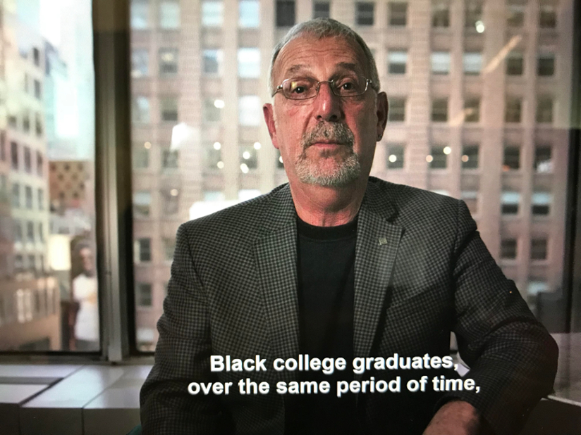A screenshot of a paused video of Prof. Thomas Shapiro