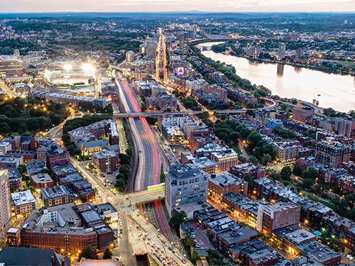 aerial photo of Boston and Cambridge at twilight
