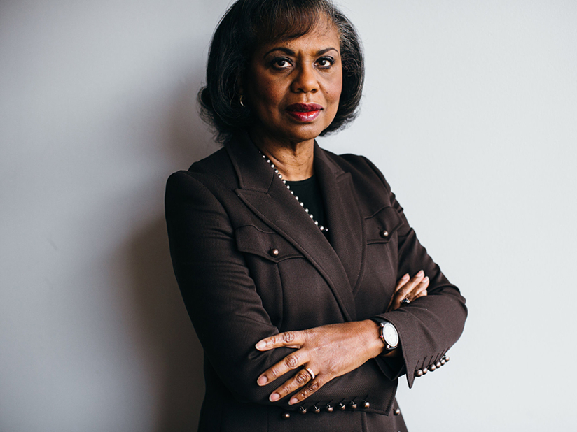 Anita Hill with her arms crossed