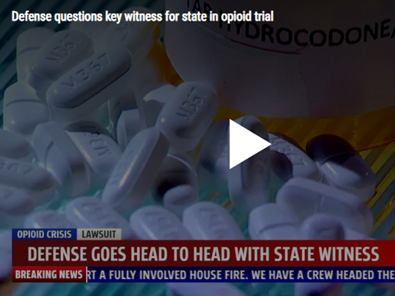 Defense questions key witness for state in opioid trial