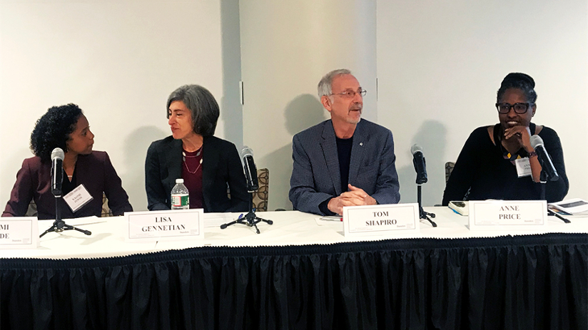 Tom Shapiro and others sitting on a panel