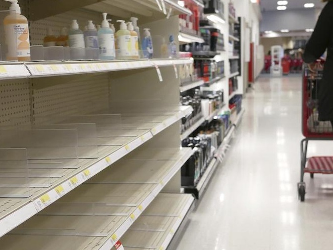 On Friday, shelves that held hand sanitizer and hand soap were mostly empty at a store in Jersey City.