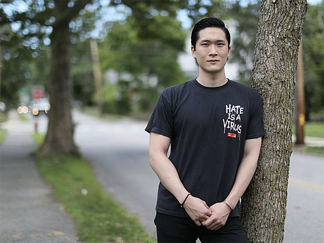 Sam Hyun, MPP'21, in a shirt that says Hate is a Virus