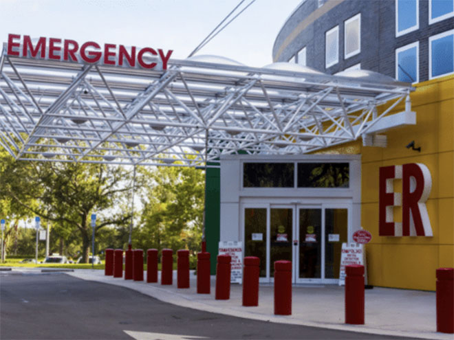 Doors to an emergency department with words Emergency and ER