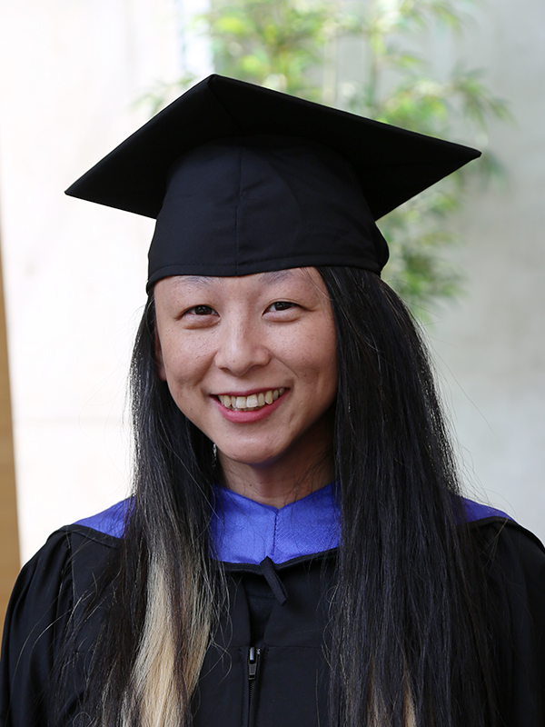 Lisa Thorn wearing a cap and gown