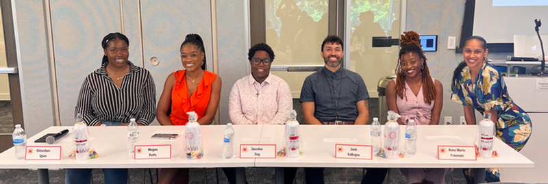 Six City Year Dallas panelist and moderator smiling towards the camera. 