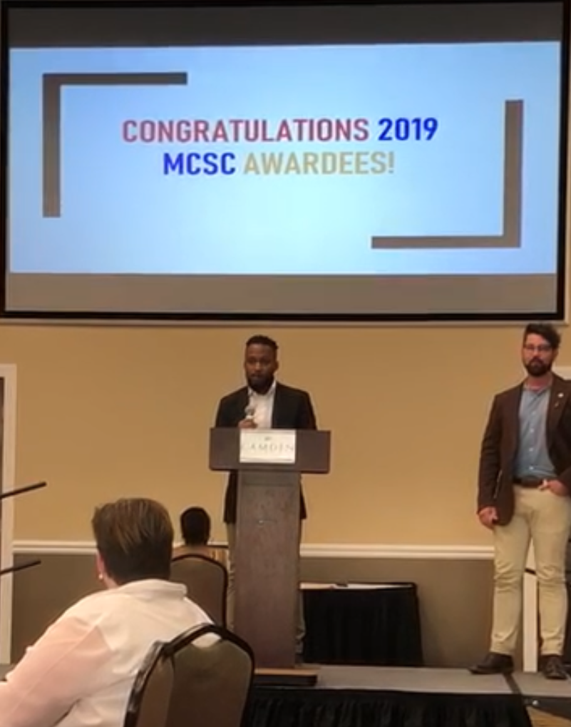 Darius receiving the 2019 MSCS Award