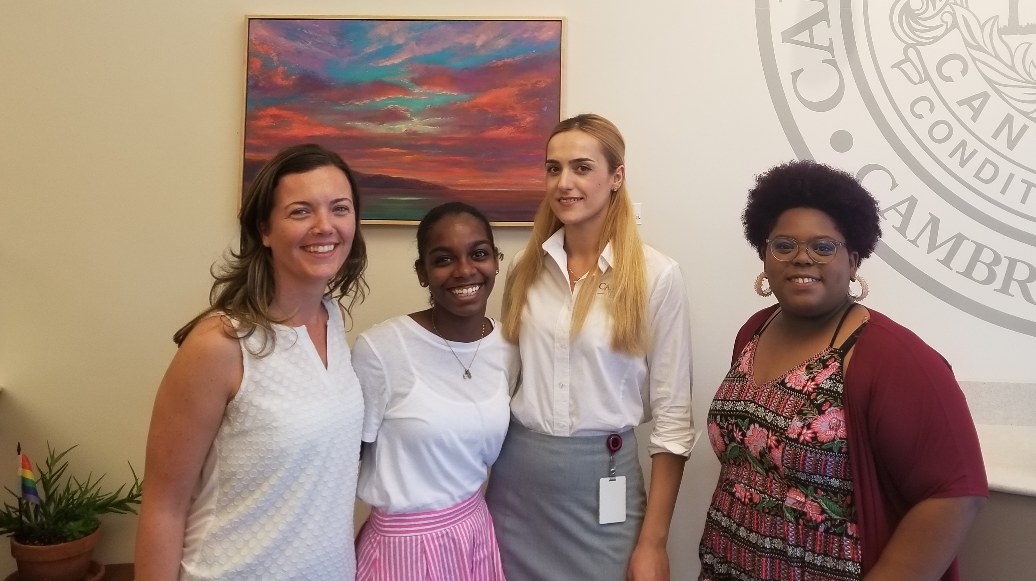 Imani Islam with staff from the Art Connection with community partner