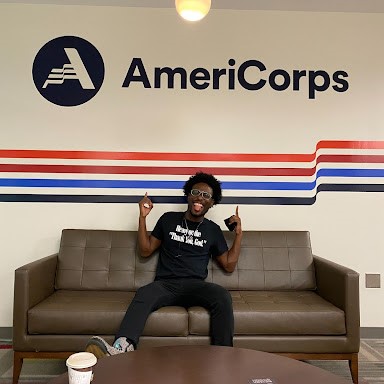 Pictured Above: Lamar Butler at the AmeriCorps offices, where he continues to work after his Segal Fellowship year there.