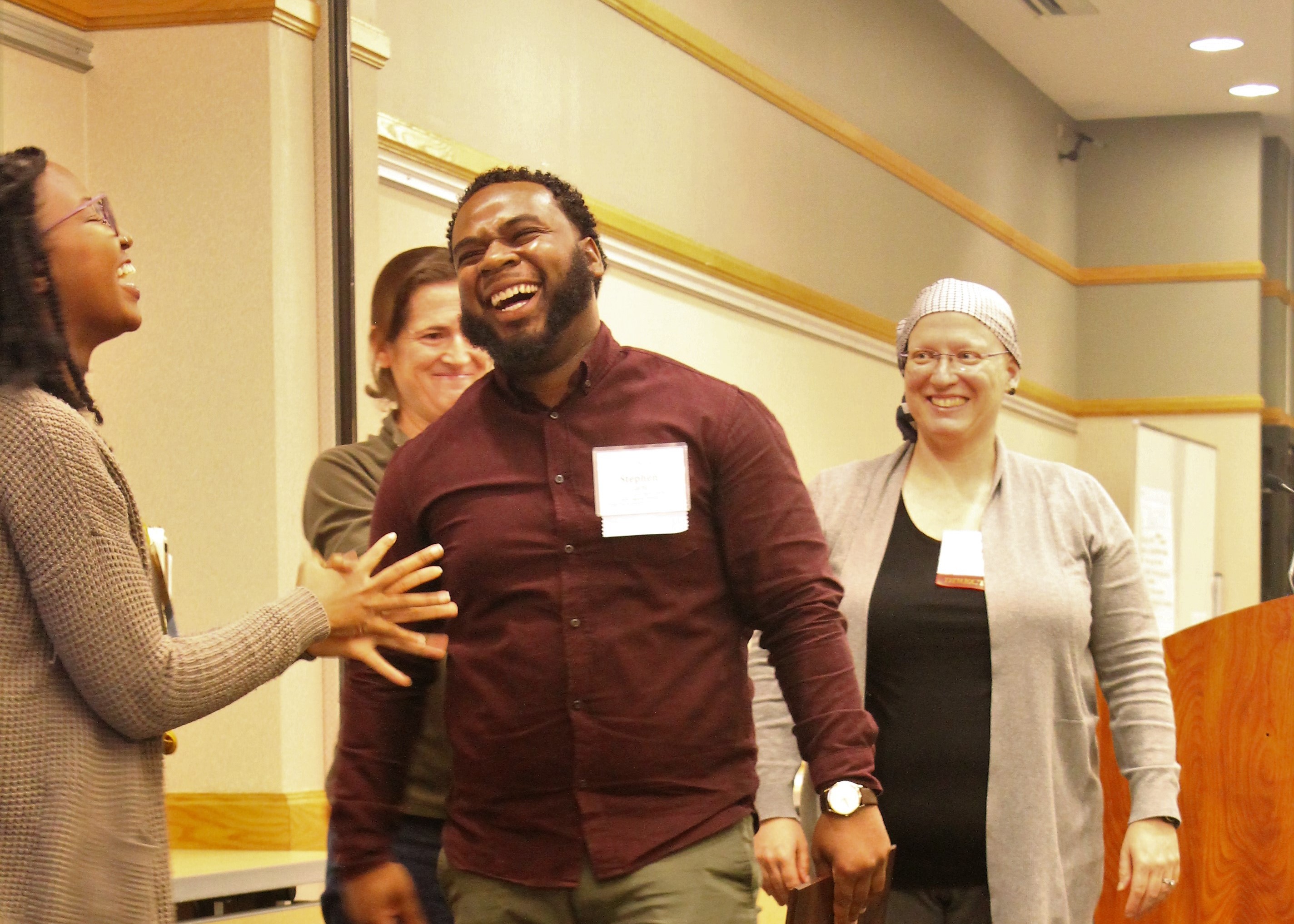 Segal Fellows Stephen Larbi laughing with LaShawn Simmons