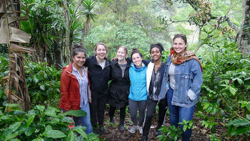 Heller MBA students Ciara Santiago, Sazia Nowshin, Megan Probst, Kendra Berry, Tezeta Tamrat, and Ariel Wexler surrounde