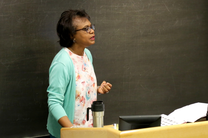 photo of Anita Hill in front of the class